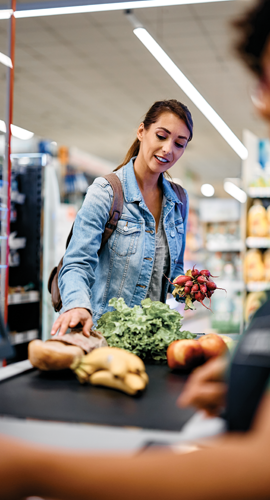 Woman grocery shopping in store